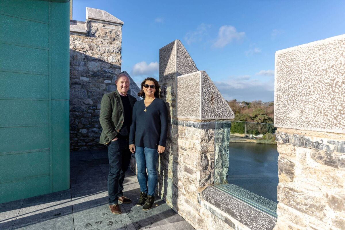 Garry and Anne Wilson on Belvelly Castle’s rooftop terrace